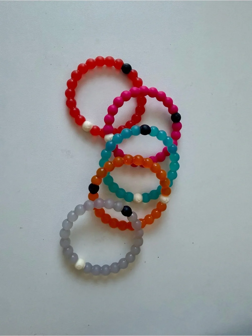 Live Loki bracelets 5: red, pink, blue, orange and grey